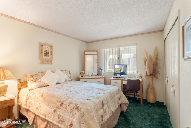 carpeted bedroom with a textured ceiling, a closet, and crown molding