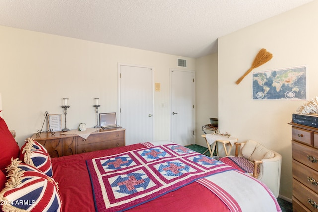 bedroom with a textured ceiling