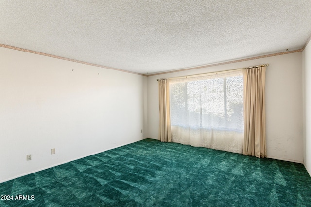 carpeted empty room with a textured ceiling and crown molding