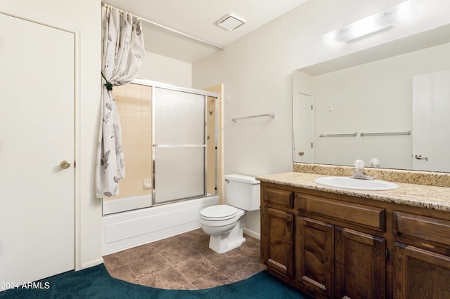 full bathroom featuring vanity, toilet, and enclosed tub / shower combo