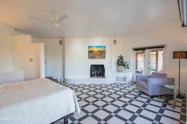 bedroom with french doors and ceiling fan