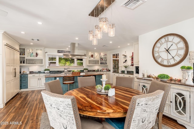 dining area featuring dark wood-style floors, visible vents, a chandelier, and recessed lighting