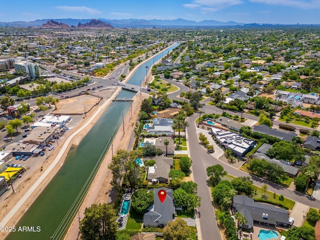 bird's eye view featuring a water and mountain view and a residential view