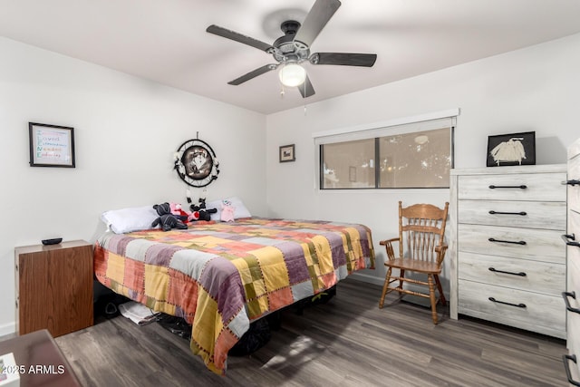 bedroom with dark hardwood / wood-style floors and ceiling fan