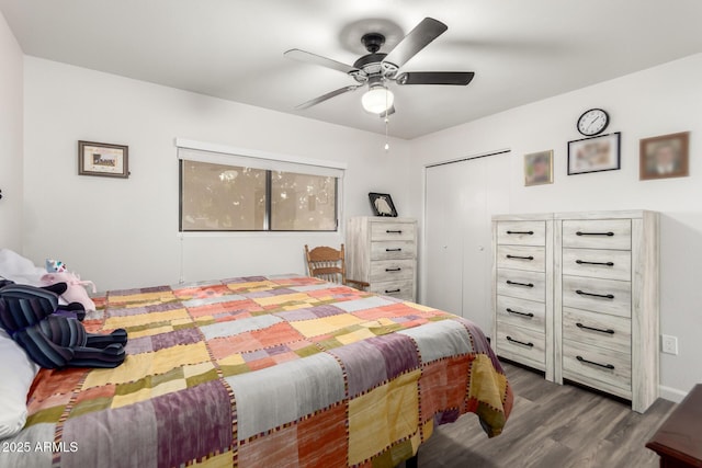 bedroom with wood-type flooring and ceiling fan