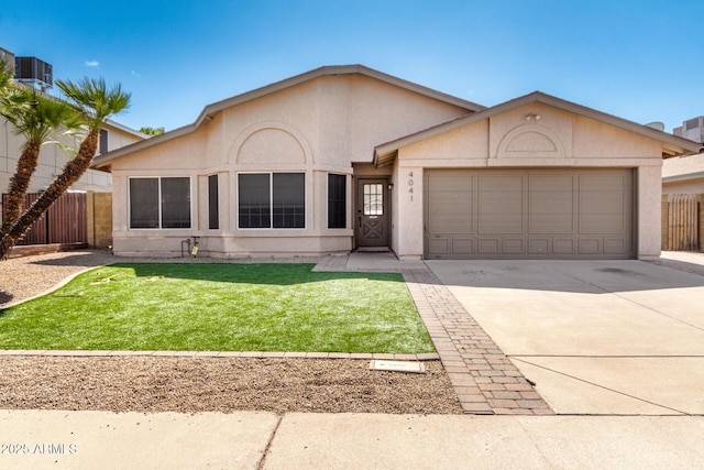 ranch-style home featuring a garage, concrete driveway, fence, and stucco siding