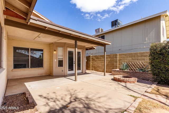 view of patio / terrace featuring fence and cooling unit