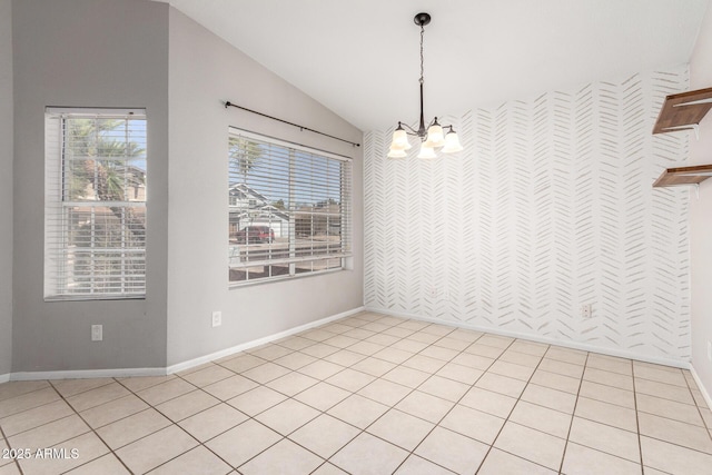 unfurnished dining area featuring lofted ceiling, light tile patterned floors, baseboards, and a chandelier