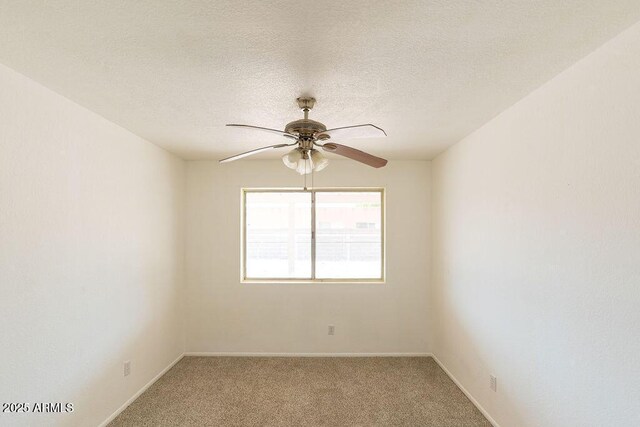 1315 Via Cabrillo, Sierra Vista, AZ 85635 - spare room with ceiling fan, light colored carpet, baseboards, and a textured ceiling