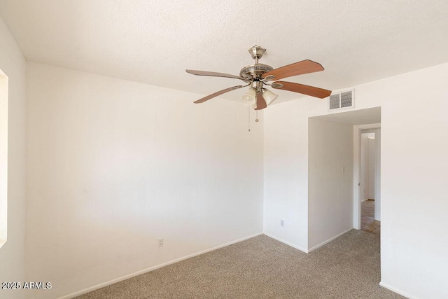 1315 Via Cabrillo, Sierra Vista, AZ 85635 - spare room featuring light colored carpet, ceiling fan, and baseboards
