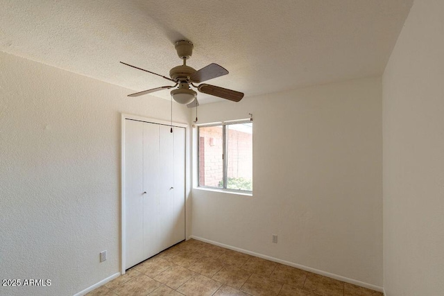1315 Via Cabrillo, Sierra Vista, AZ 85635 - unfurnished bedroom with baseboards, a closet, and ceiling fan