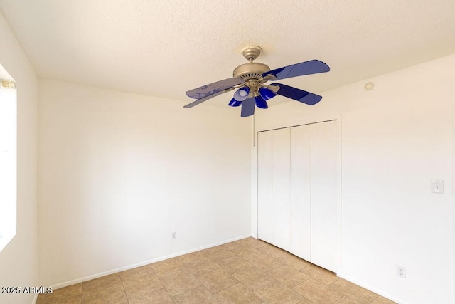 1315 Via Cabrillo, Sierra Vista, AZ 85635 - empty room with a ceiling fan, a textured ceiling, and baseboards