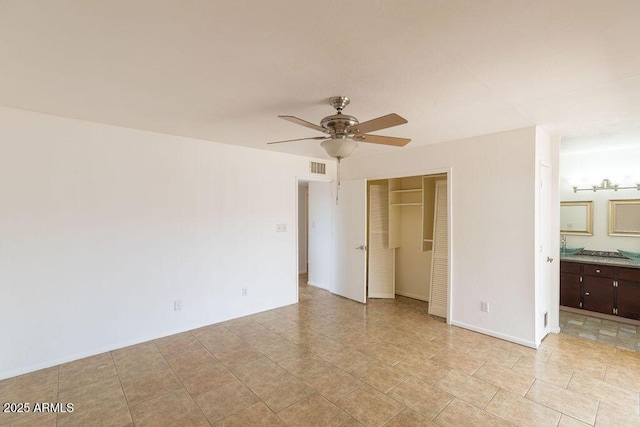 1315 Via Cabrillo, Sierra Vista, AZ 85635 - unfurnished bedroom with a closet, ensuite bath, and ceiling fan