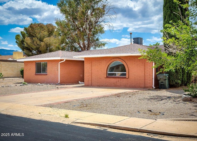 1315 Via Cabrillo, Sierra Vista, AZ 85635 - ranch-style home with brick siding, central AC, and a shingled roof