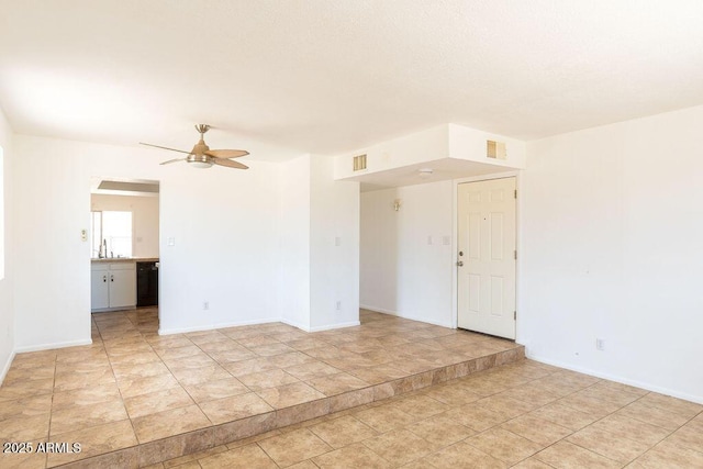 1315 Via Cabrillo, Sierra Vista, AZ 85635 - empty room featuring ceiling fan and baseboards