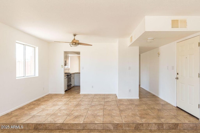 1315 Via Cabrillo, Sierra Vista, AZ 85635 - empty room with ceiling fan and baseboards
