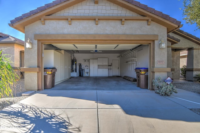 garage with strapped water heater