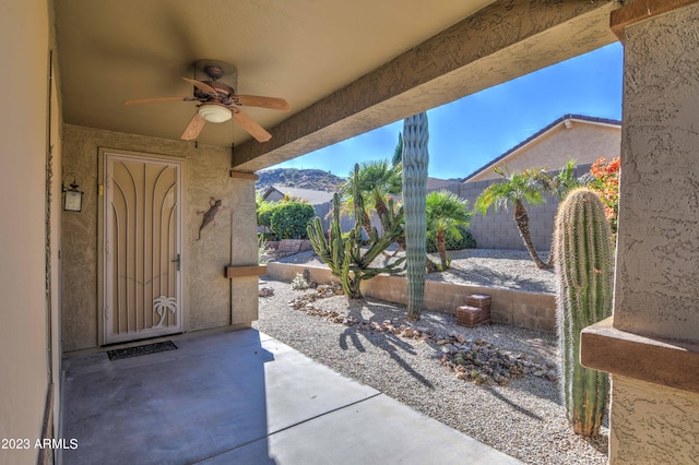 view of patio featuring ceiling fan