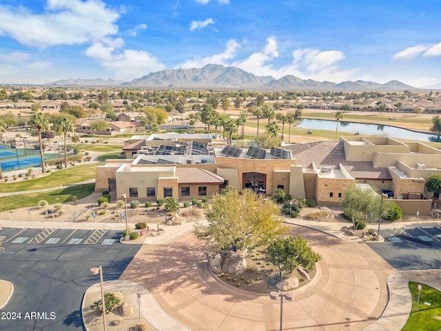 birds eye view of property featuring a mountain view