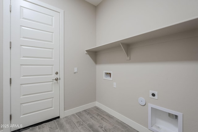 laundry room with gas dryer hookup, hookup for a washing machine, and hookup for an electric dryer