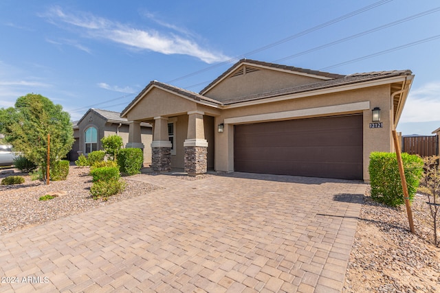 view of front of home with a garage