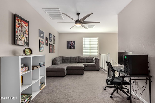 office space featuring carpet and ceiling fan