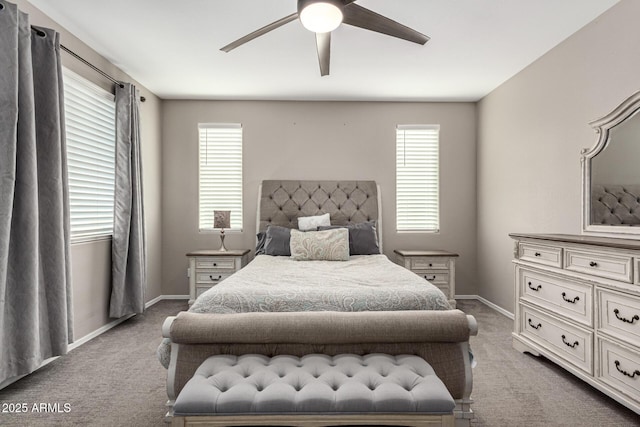 bedroom with ceiling fan and carpet