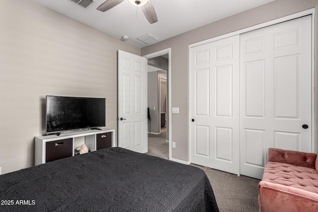 bedroom with a closet, ceiling fan, and carpet