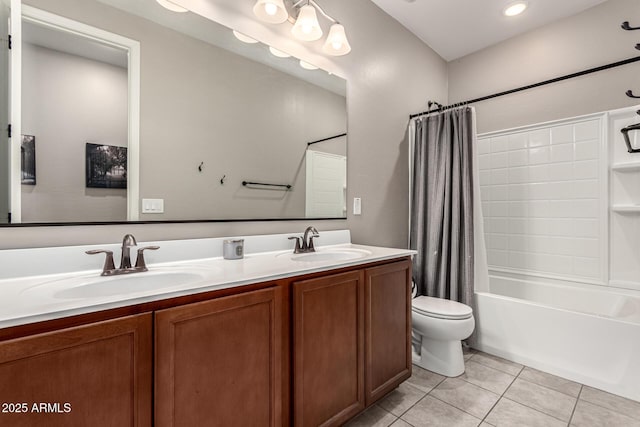 full bathroom with vanity, toilet, tile patterned floors, and shower / bath combo with shower curtain