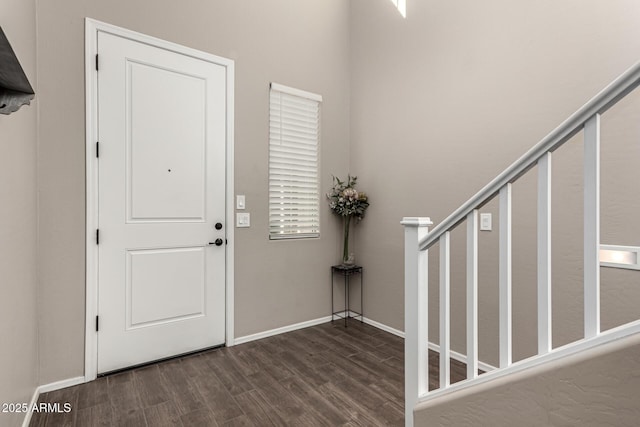 entrance foyer featuring dark hardwood / wood-style flooring