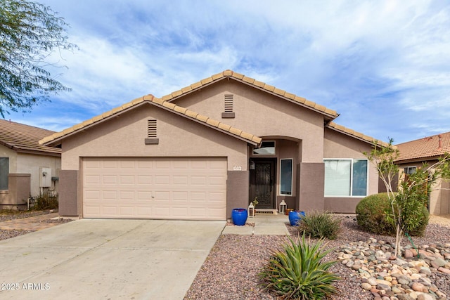 view of front of property with a garage