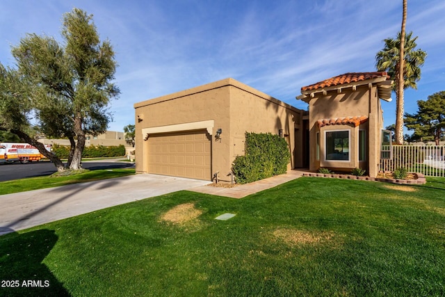 mediterranean / spanish-style home with an attached garage, fence, concrete driveway, stucco siding, and a front lawn