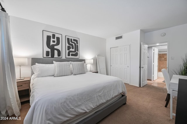 357 E Thomas Rd Unit A208, Phoenix, AZ 85012 - carpeted bedroom featuring a closet