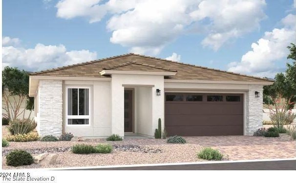 view of front of home with a garage