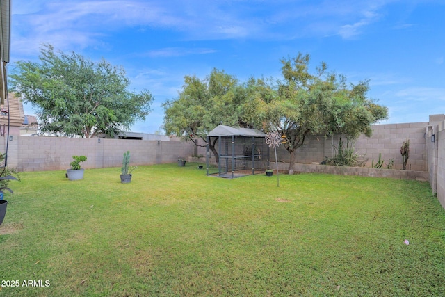 view of yard featuring a fenced backyard