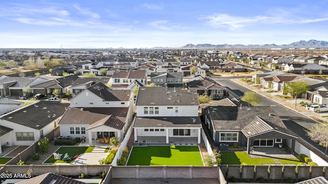 aerial view featuring a mountain view and a residential view