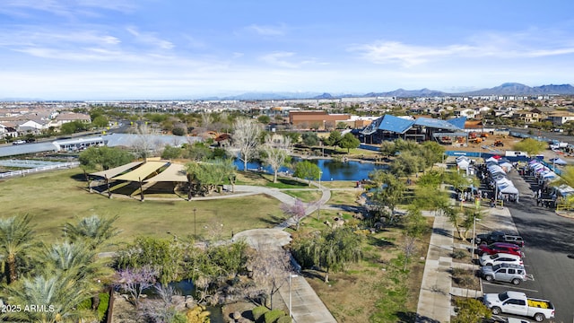 birds eye view of property with a residential view and a water and mountain view