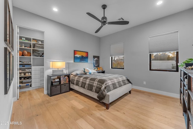 bedroom with recessed lighting, visible vents, light wood-style flooring, and baseboards