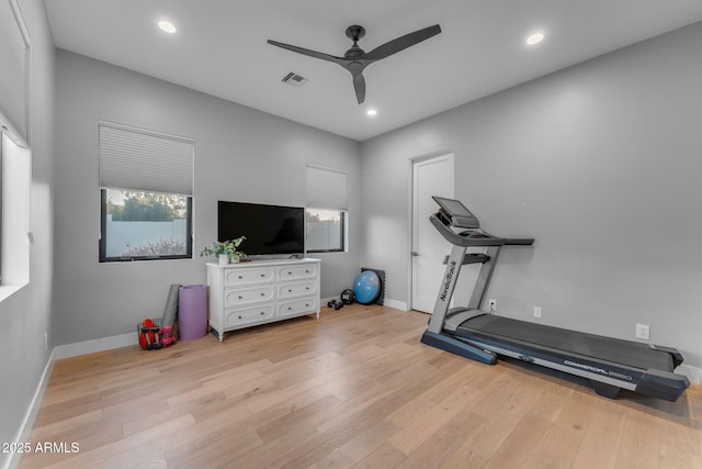 workout area featuring a ceiling fan, recessed lighting, wood finished floors, and baseboards