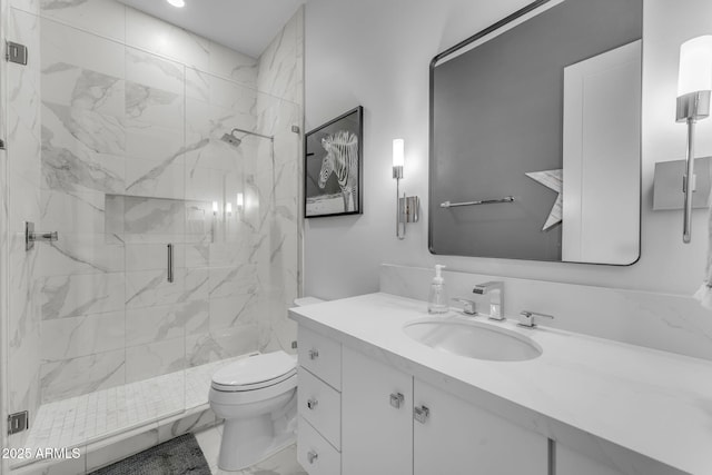 full bathroom featuring a marble finish shower, toilet, marble finish floor, and vanity