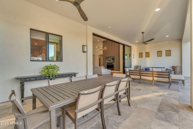 view of patio with outdoor lounge area and a ceiling fan