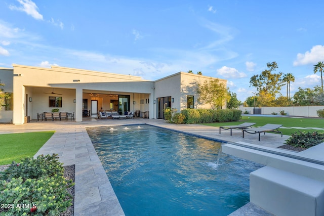 view of pool with a fenced in pool, an outdoor living space, fence, a lawn, and a patio