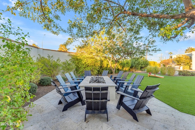 view of patio featuring a fire pit