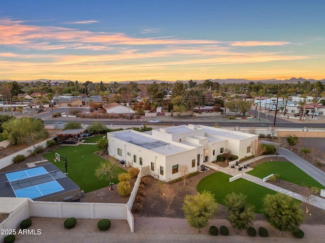 birds eye view of property featuring a mountain view and a residential view