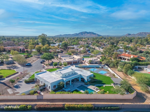 birds eye view of property with a mountain view and a residential view