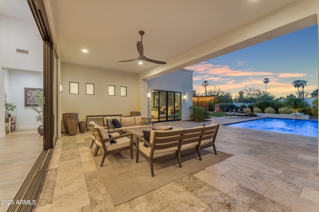 view of patio with visible vents, a ceiling fan, a fenced in pool, and outdoor lounge area