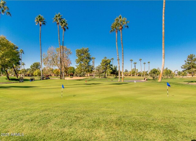 9733 W Mcrae Way, Peoria, AZ 85382 - surrounding community featuring a putting area, golf course view, and a lawn