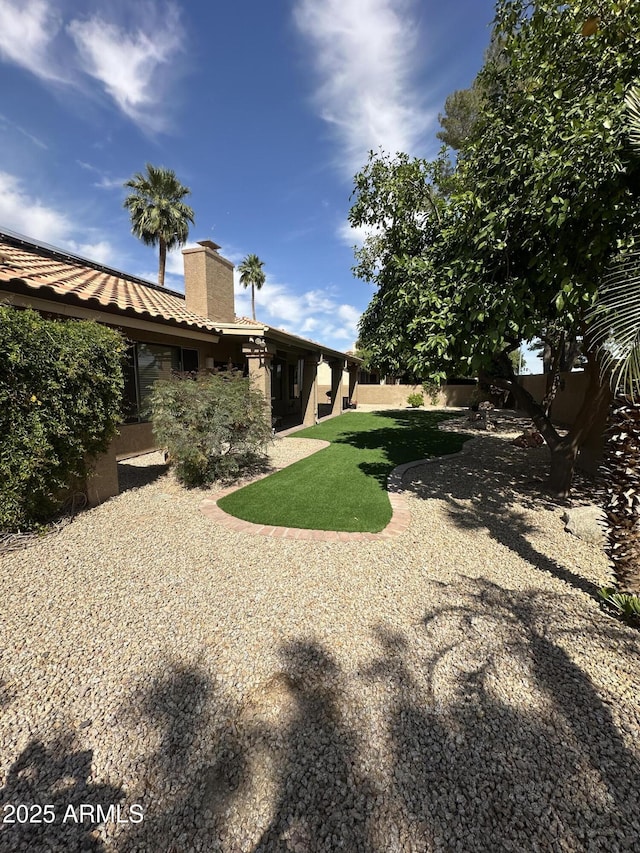 view of yard with fence