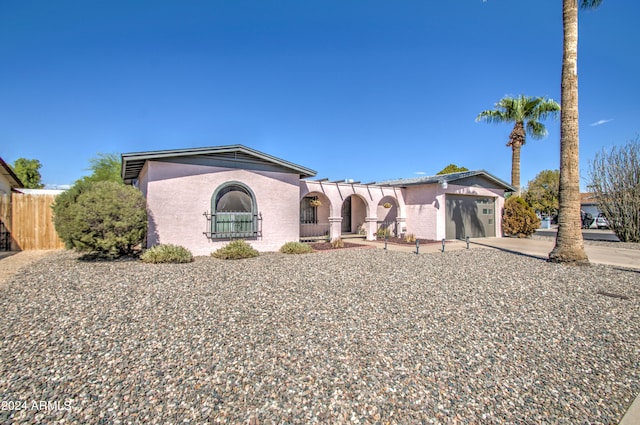 view of front of home featuring a garage