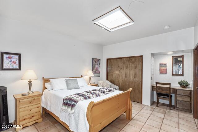 25 Edgewood Cir, Sedona, AZ 86336 - bedroom with light tile patterned floors and a closet